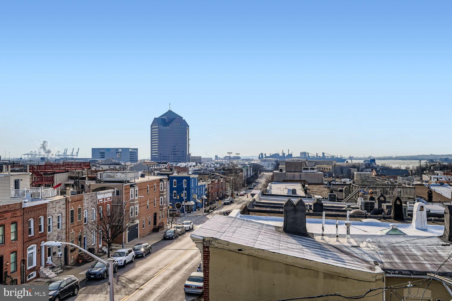 3143 Dillon Street Baltimore, MD 21224 - Photo 26 of 26 Urban skyline meets charming streetscape.