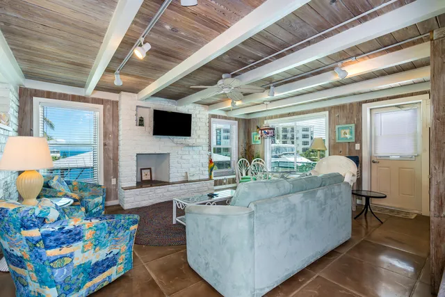 a kitchen with sink stove and refrigerator