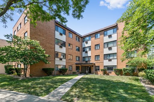 6826 North Ridge Boulevard, Unit 305 Chicago, IL 60645 - Photo 1 of 13 a building view with a garden space
