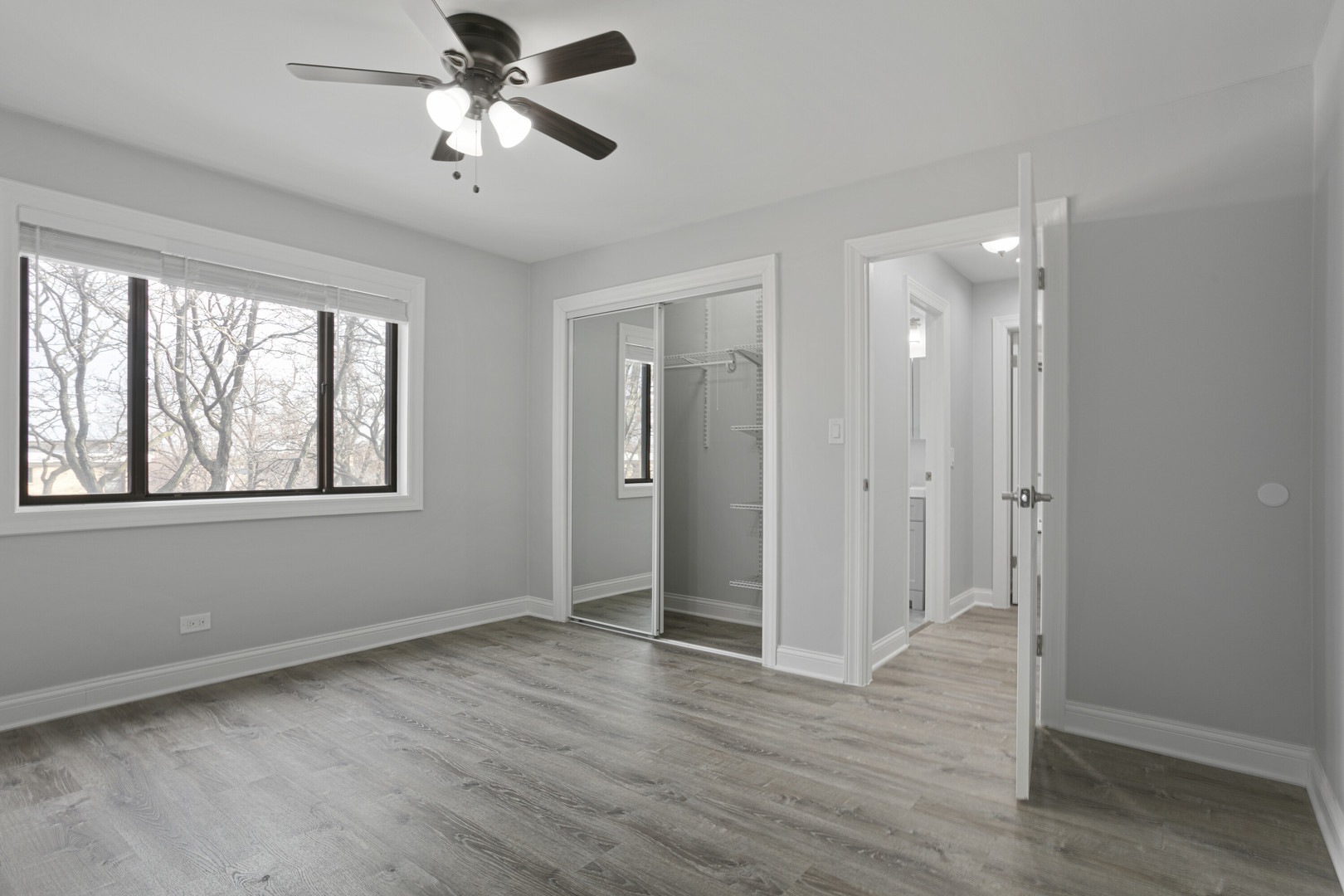 6826 North Ridge Boulevard, Unit 305 Chicago, IL 60645 - Photo 7 of 13 a view of an empty room with a window