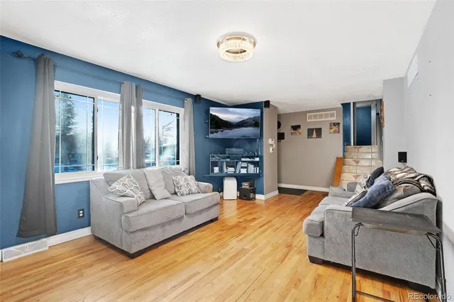 a living room with furniture and a couch