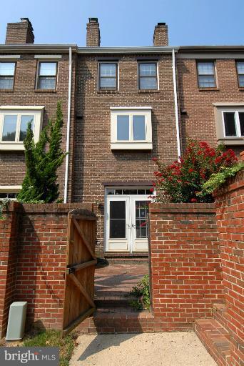 1109 Portner Road Alexandria, VA 22314 - Photo 4 of 23 Rear patio and gate to parking