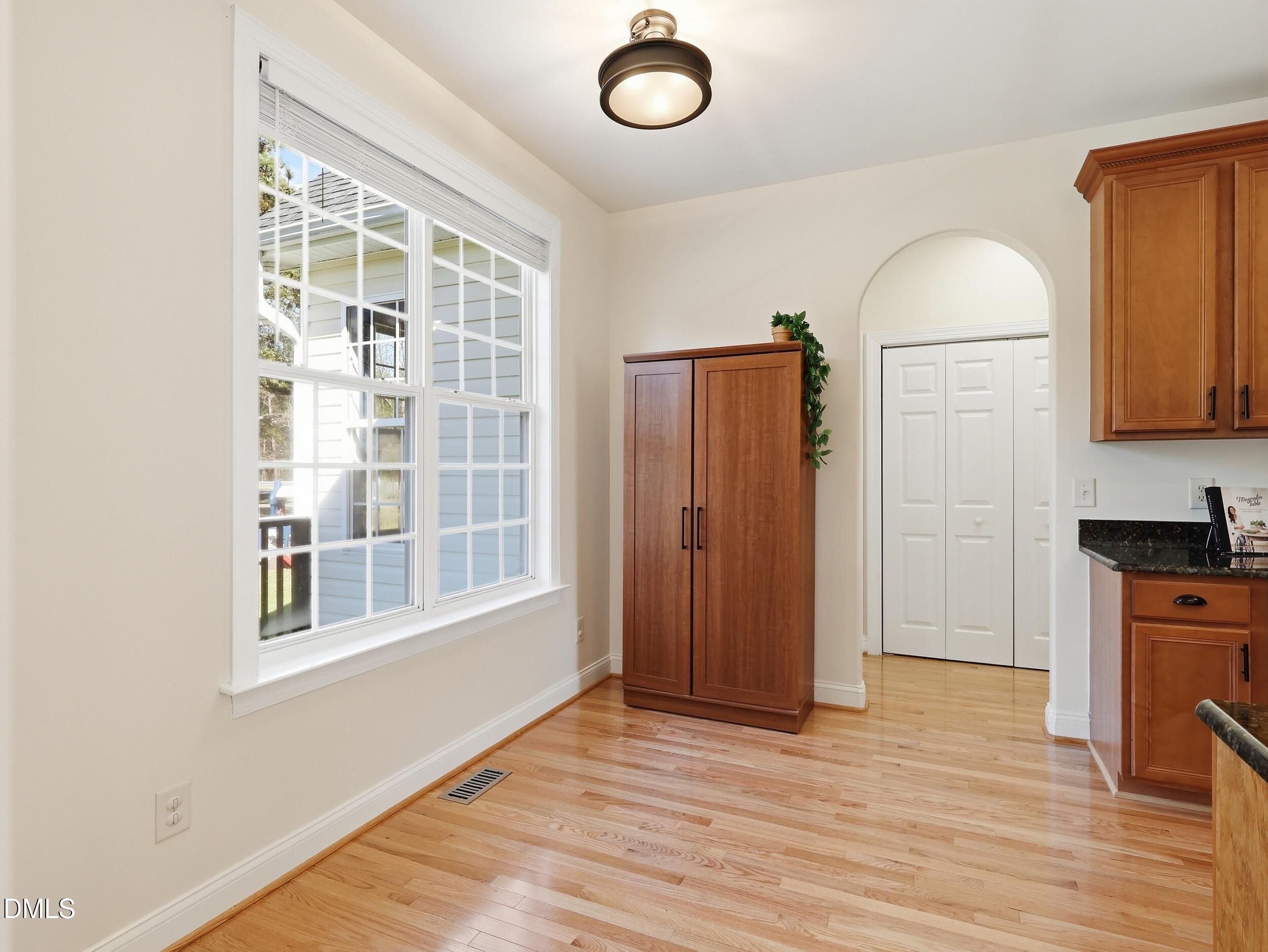 10 Kinderkamack Road Youngsville, NC 27596 - Photo 14 of 46 a view of livingroom with furniture wooden floor and window