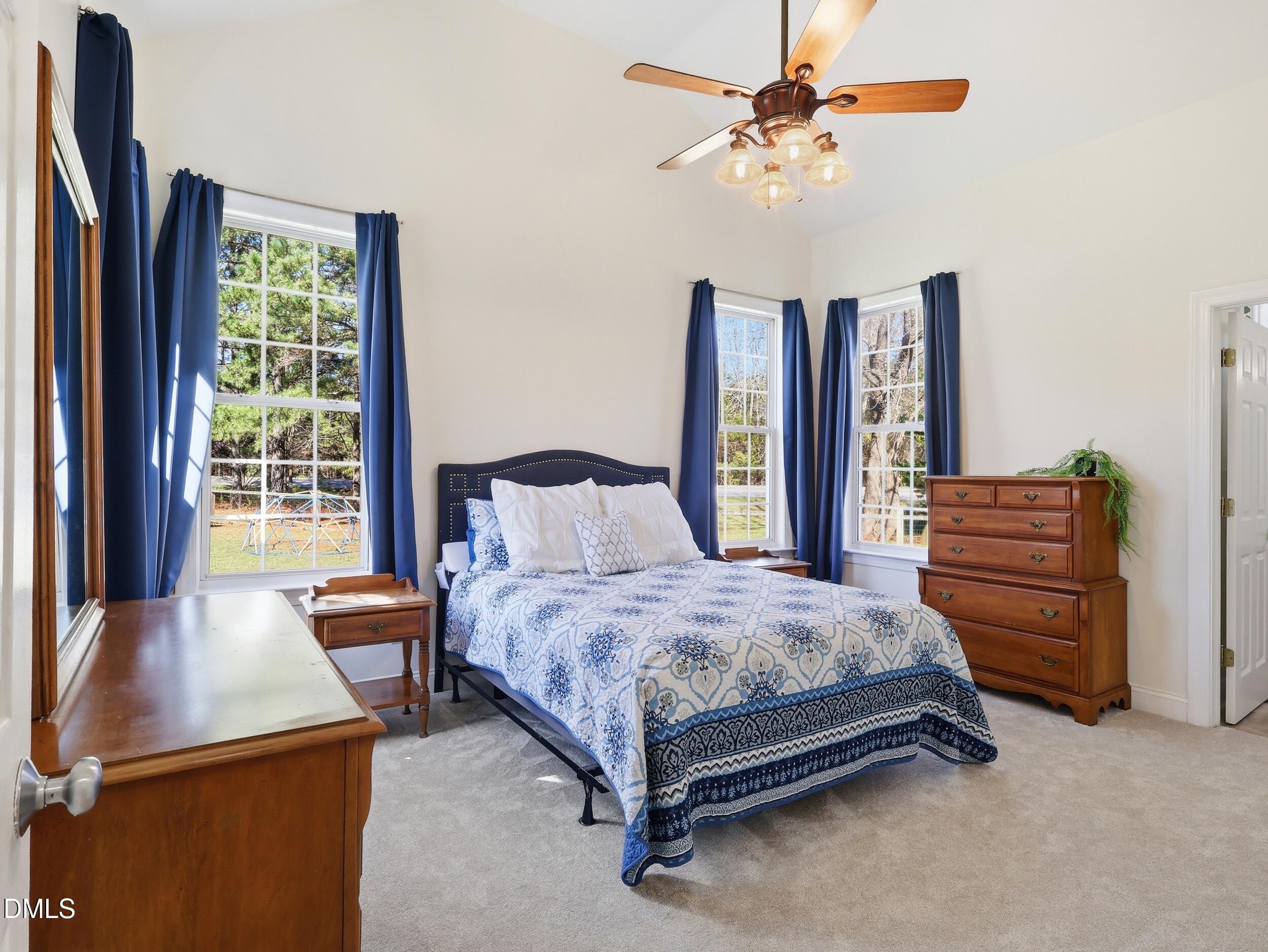 10 Kinderkamack Road Youngsville, NC 27596 - Photo 15 of 46 a bedroom with bed and window