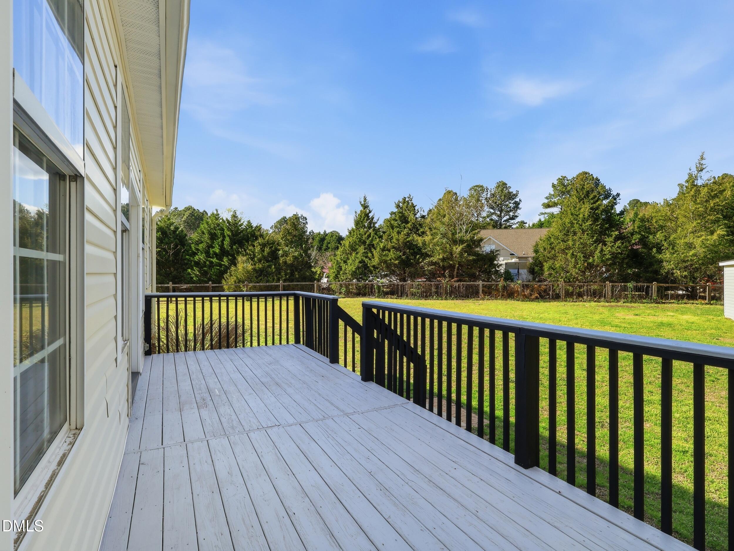 10 Kinderkamack Road Youngsville, NC 27596 - Photo 27 of 46 a view of a wooden deck