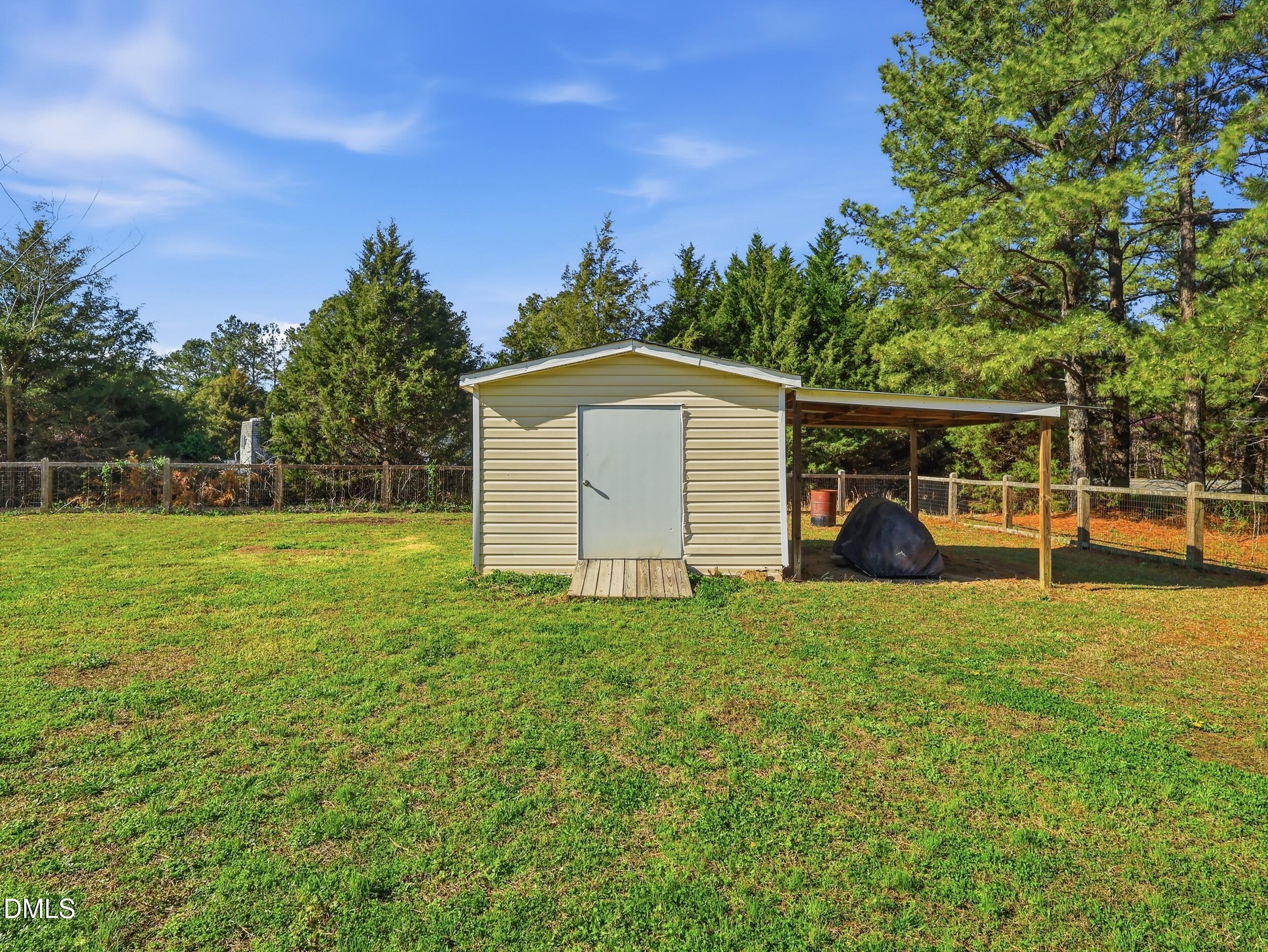 10 Kinderkamack Road Youngsville, NC 27596 - Photo 28 of 46 a view of a house with backyard