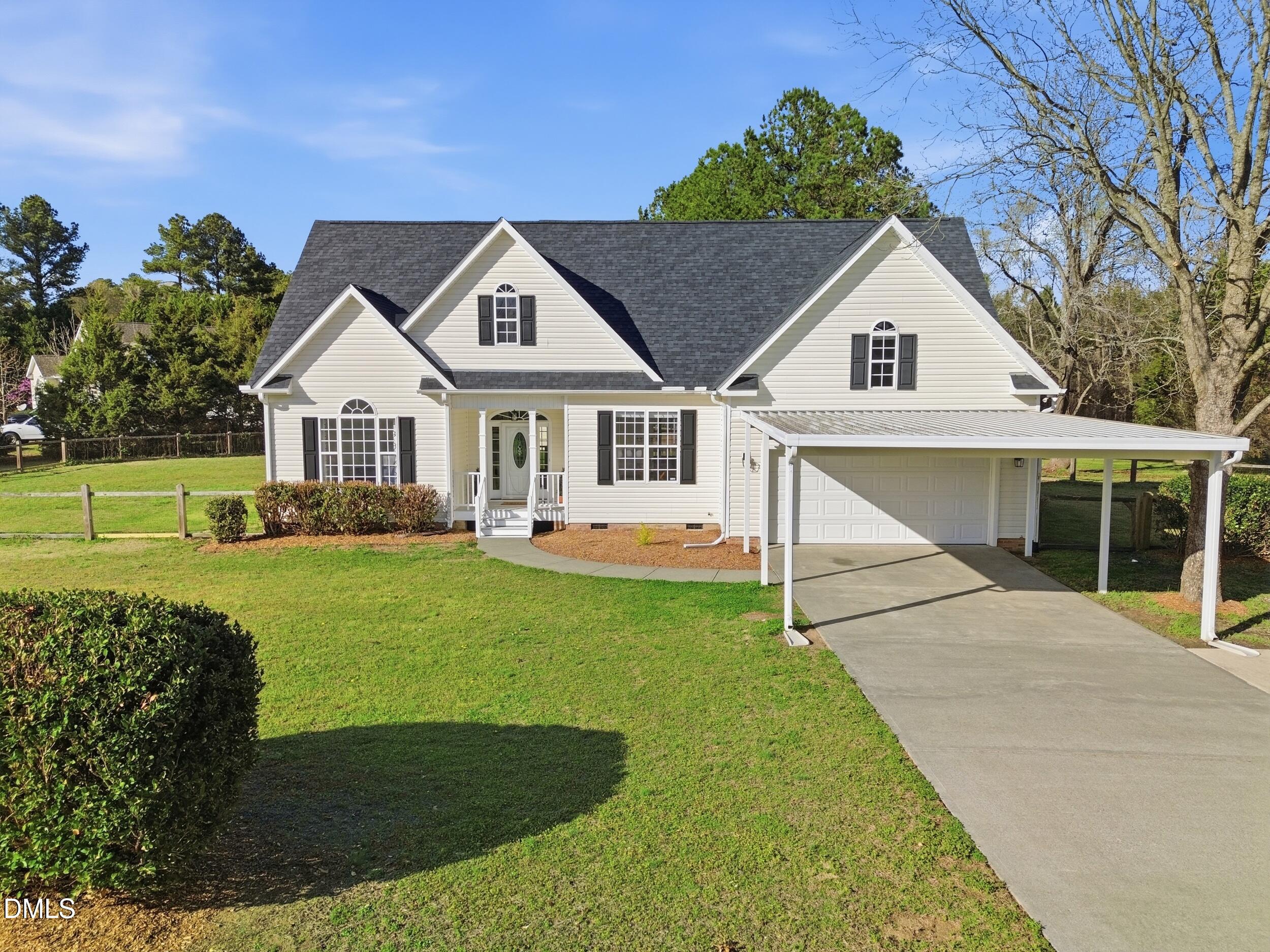 10 Kinderkamack Road Youngsville, NC 27596 - Photo 2 of 46 a front view of a house with a yard