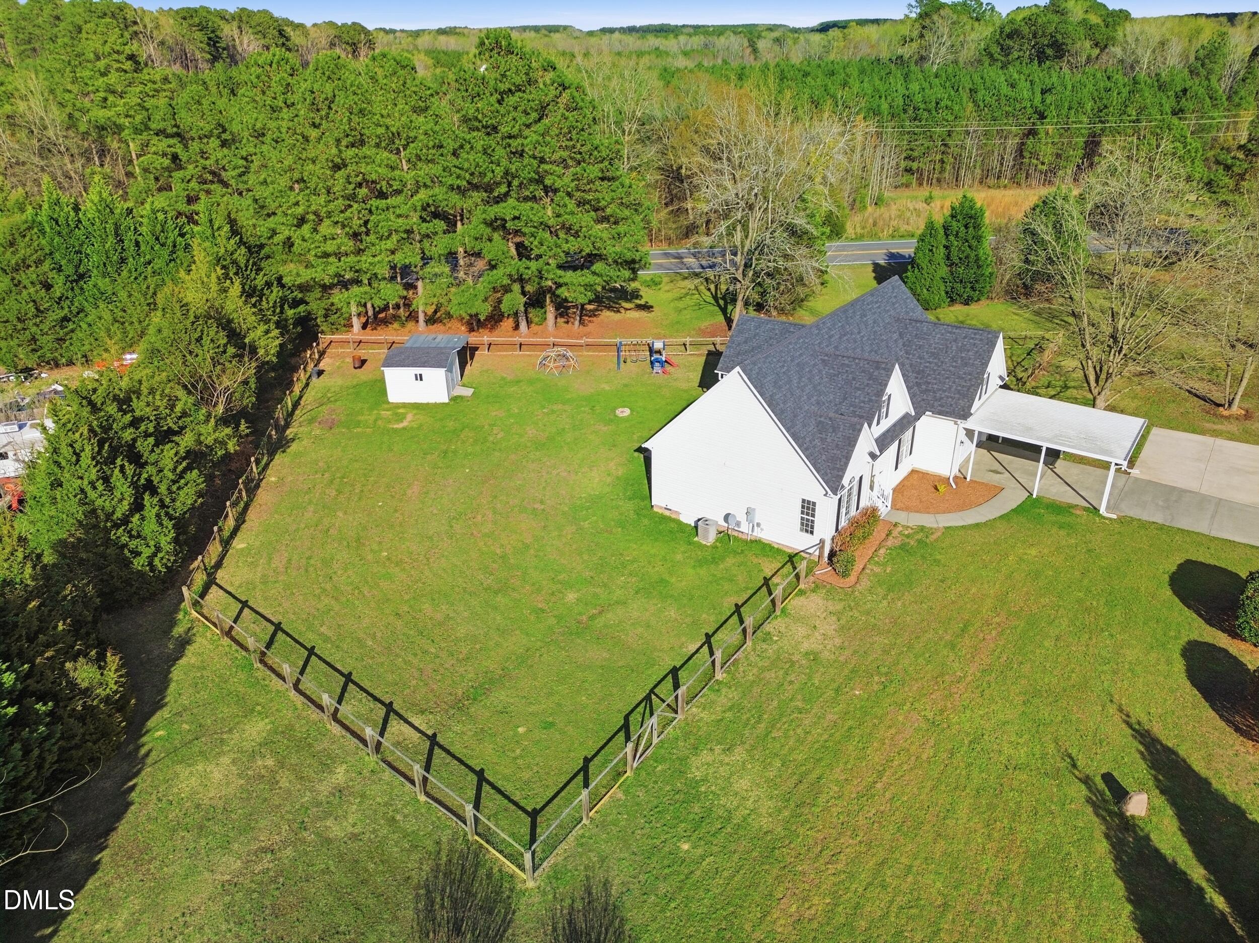 10 Kinderkamack Road Youngsville, NC 27596 - Photo 30 of 46 an aerial view of a residential houses with outdoor space and trees