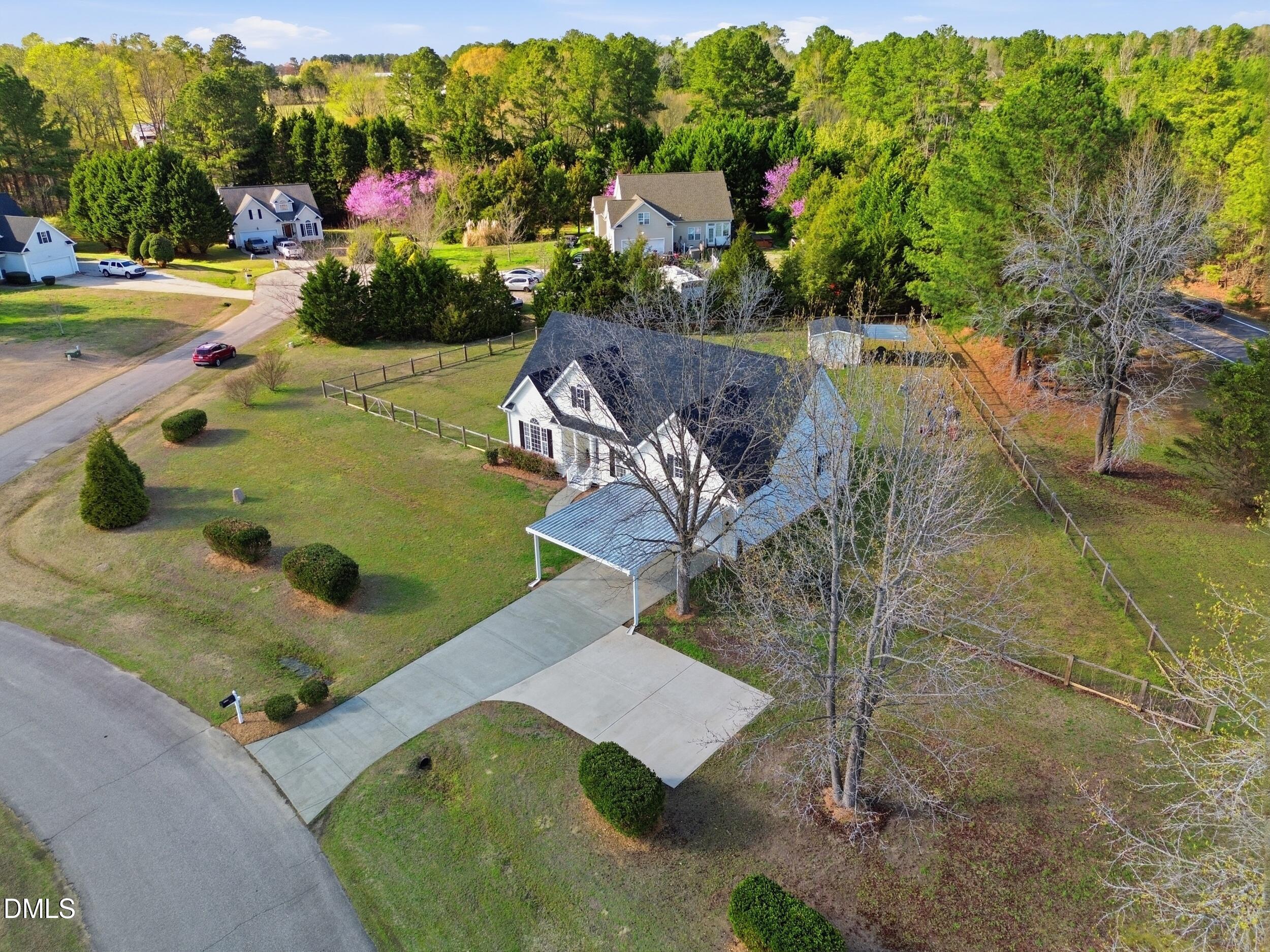 10 Kinderkamack Road Youngsville, NC 27596 - Photo 32 of 46 an aerial view of a house with a yard and lake view