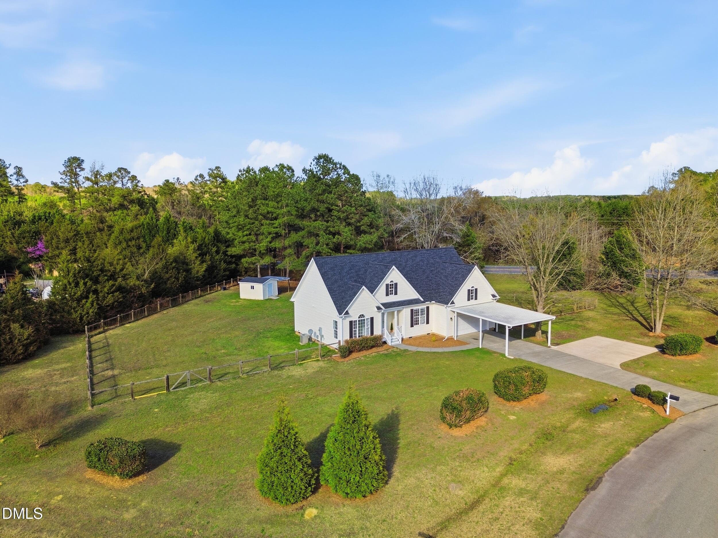 10 Kinderkamack Road Youngsville, NC 27596 - Photo 33 of 46 a view of a swimming pool with a yard