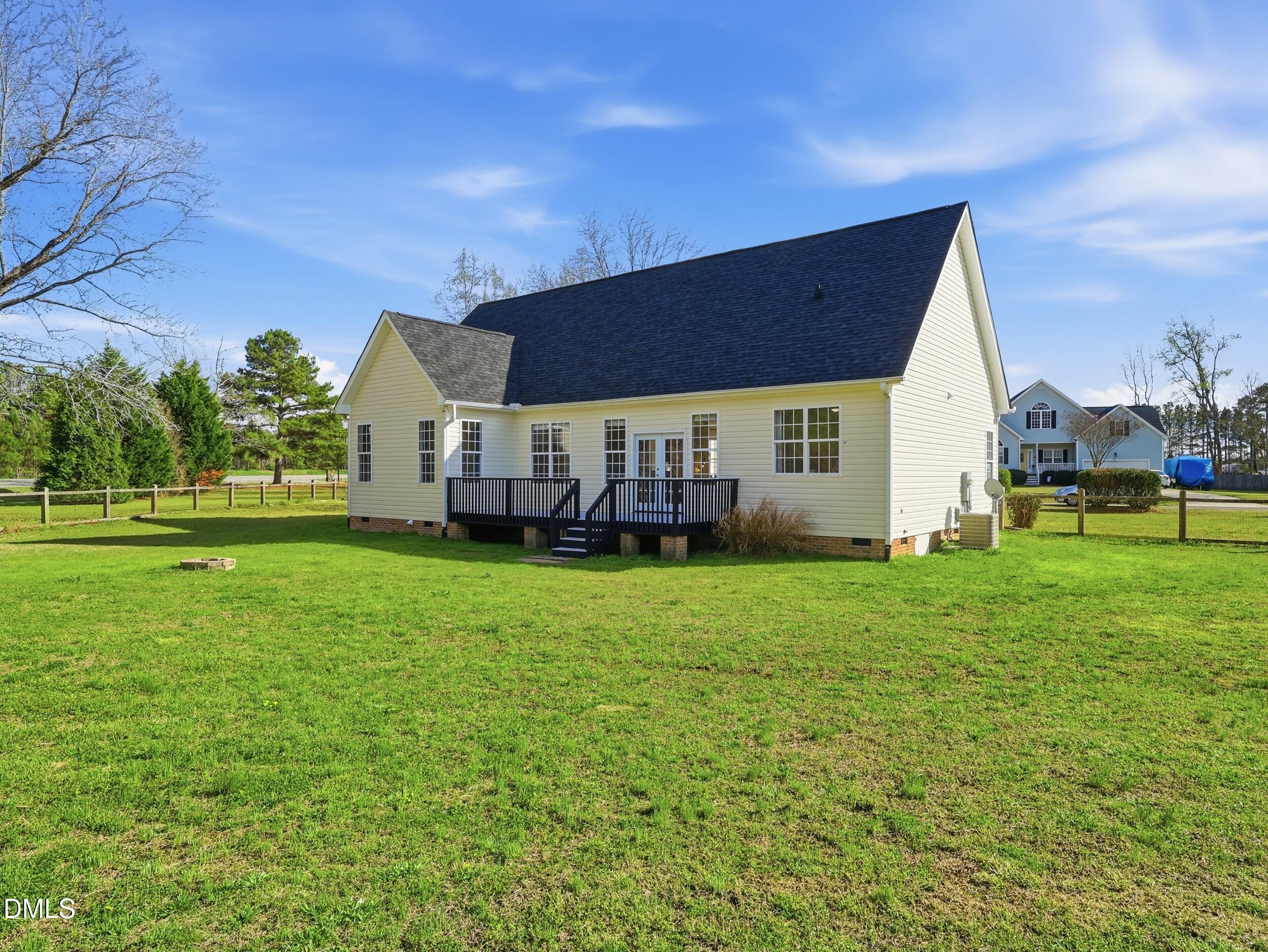 10 Kinderkamack Road Youngsville, NC 27596 - Photo 36 of 46 a view of a house with a backyard