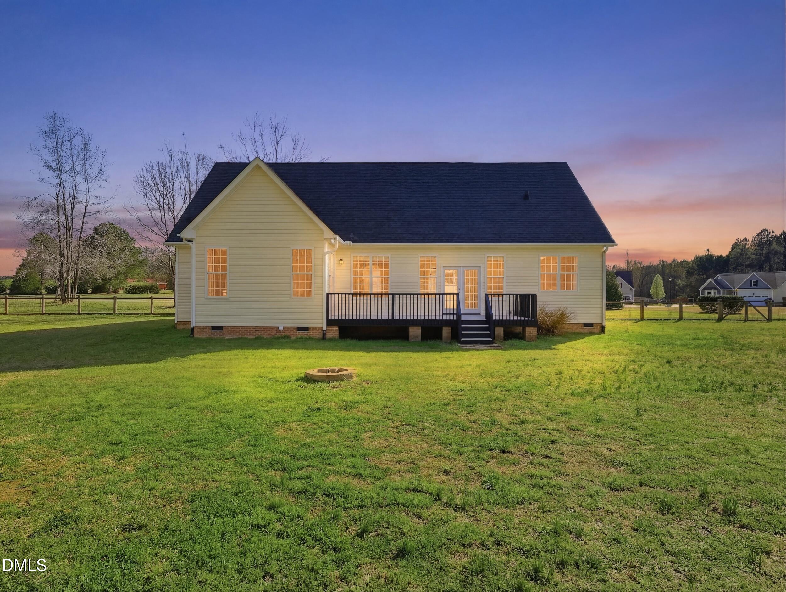 10 Kinderkamack Road Youngsville, NC 27596 - Photo 39 of 46 a view of a house with a yard