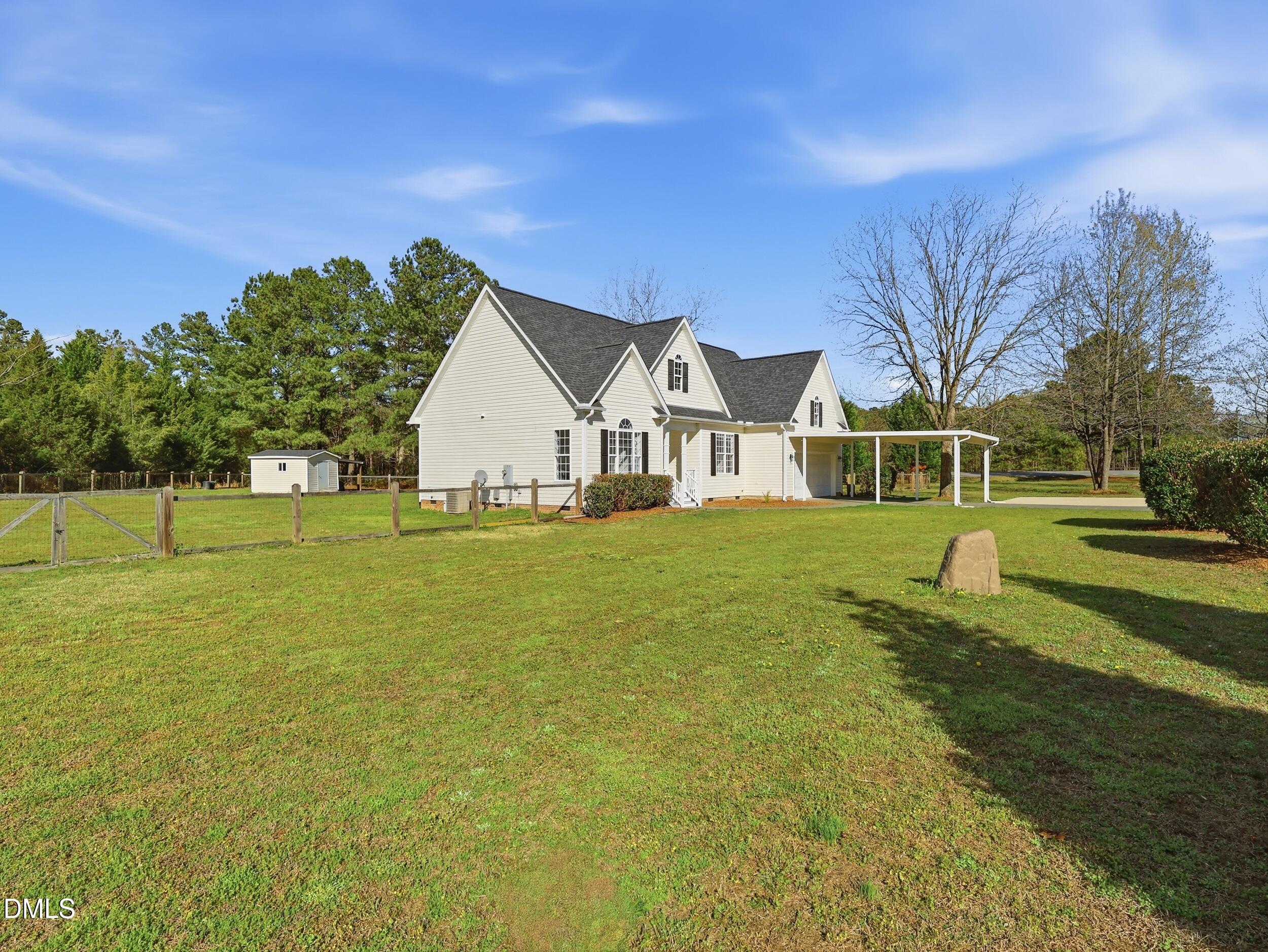 10 Kinderkamack Road Youngsville, NC 27596 - Photo 42 of 46 a view of a house with a yard