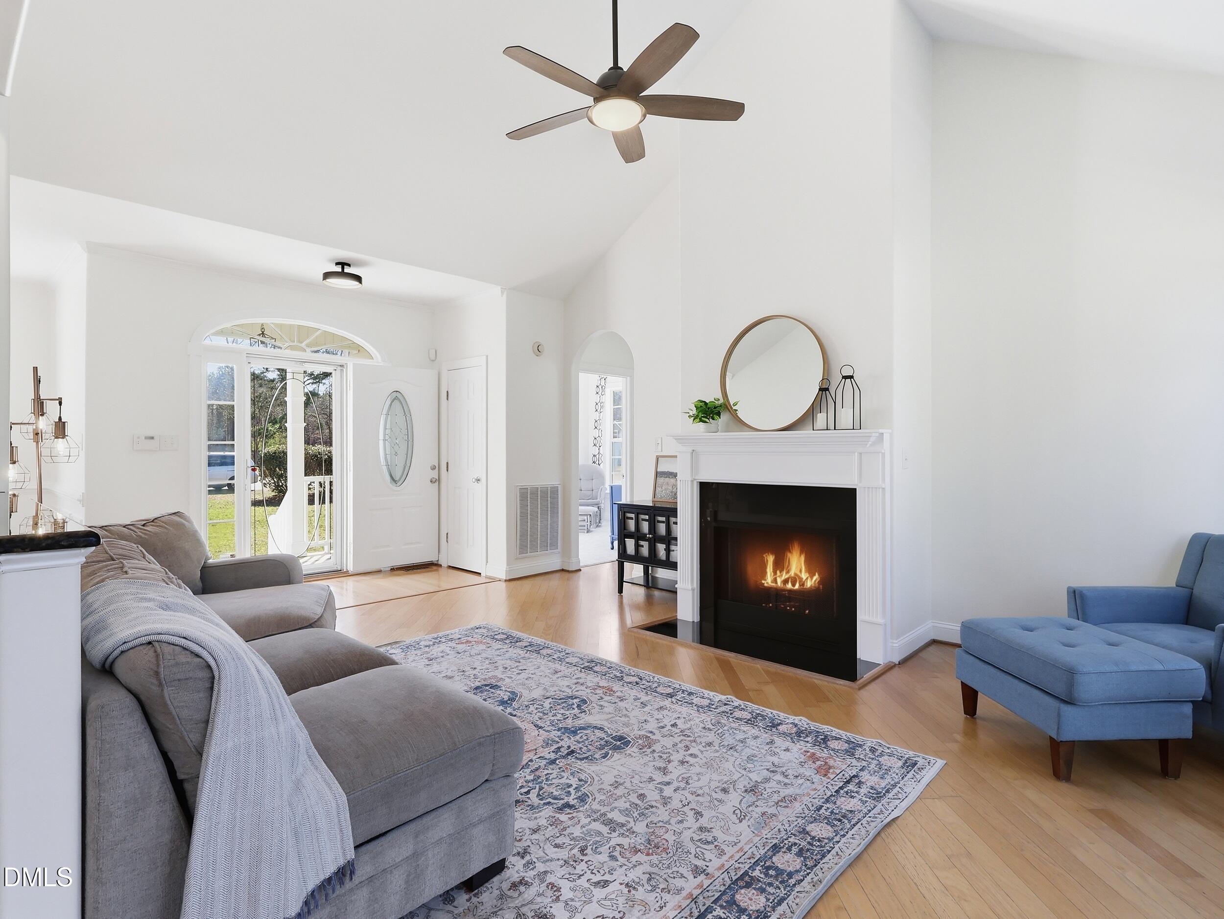 10 Kinderkamack Road Youngsville, NC 27596 - Photo 4 of 46 a living room with furniture and a fireplace