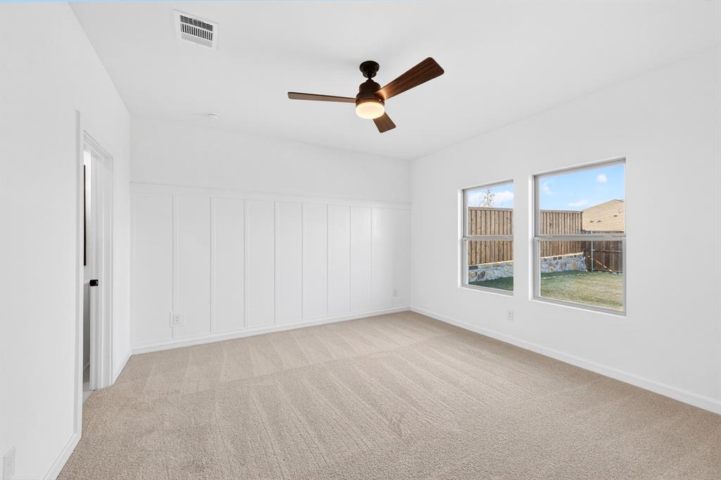 1313 Richardson Street Howe, TX 75459 - Photo 16 of 28 a view of room with hardwood floor and windows