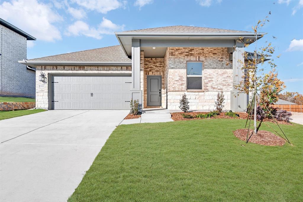 1313 Richardson Street Howe, TX 75459 - Photo 2 of 28 a front view of a house with a yard