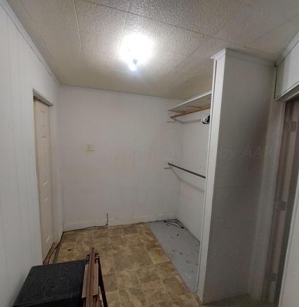 1608 Backus Street Paducah, TX 79248 - Photo 18 of 21 Walk in closet featuring light floors