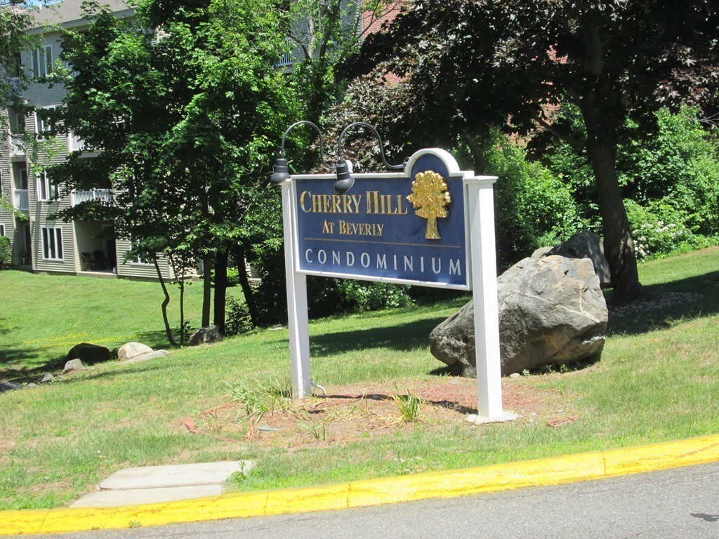 4 Duck Pond Road, Unit 204 Beverly, MA 01915 - Photo 1 of 23 a house view with a swimming pool and garden