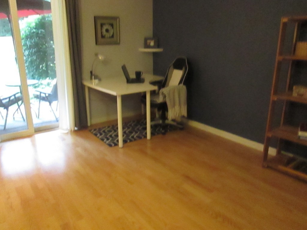 4 Duck Pond Road, Unit 204 Beverly, MA 01915 - Photo 16 of 23 a workspace with furniture and a window