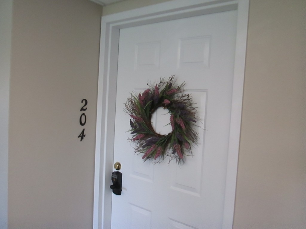 4 Duck Pond Road, Unit 204 Beverly, MA 01915 - Photo 5 of 23 a close up of a shower