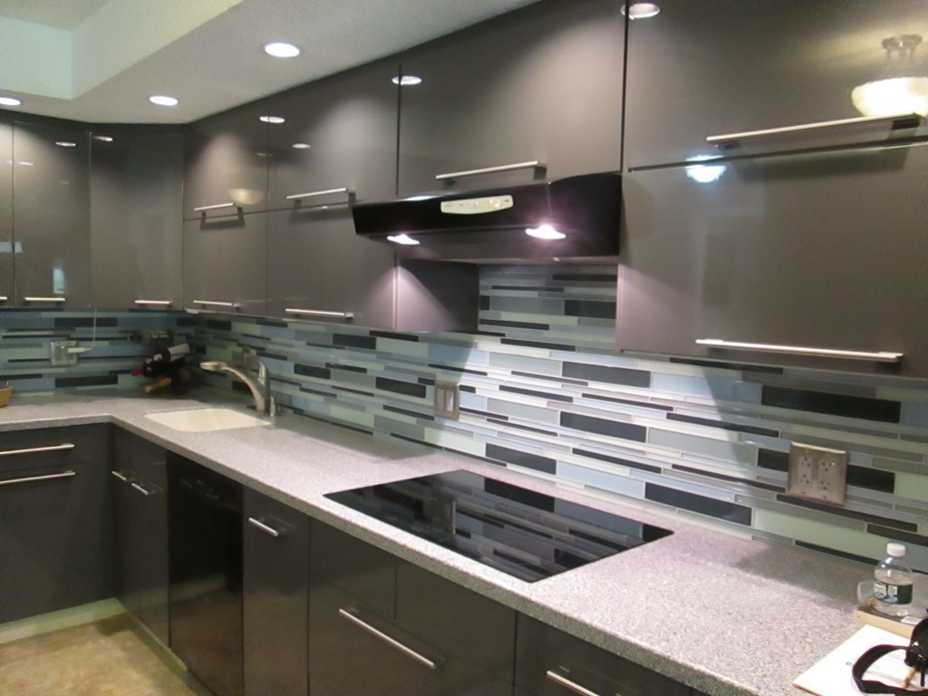 4 Duck Pond Road, Unit 204 Beverly, MA 01915 - Photo 10 of 23 a kitchen with a sink and cabinets