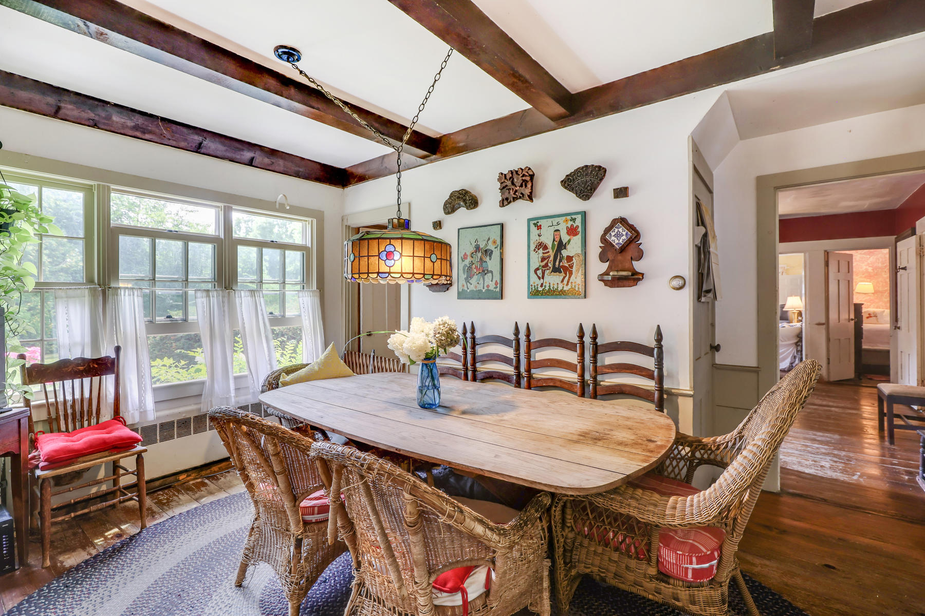 118 Old Stage Road Centerville, MA 02632 - Photo 12 of 41 a dining room with furniture a rug and wooden floor