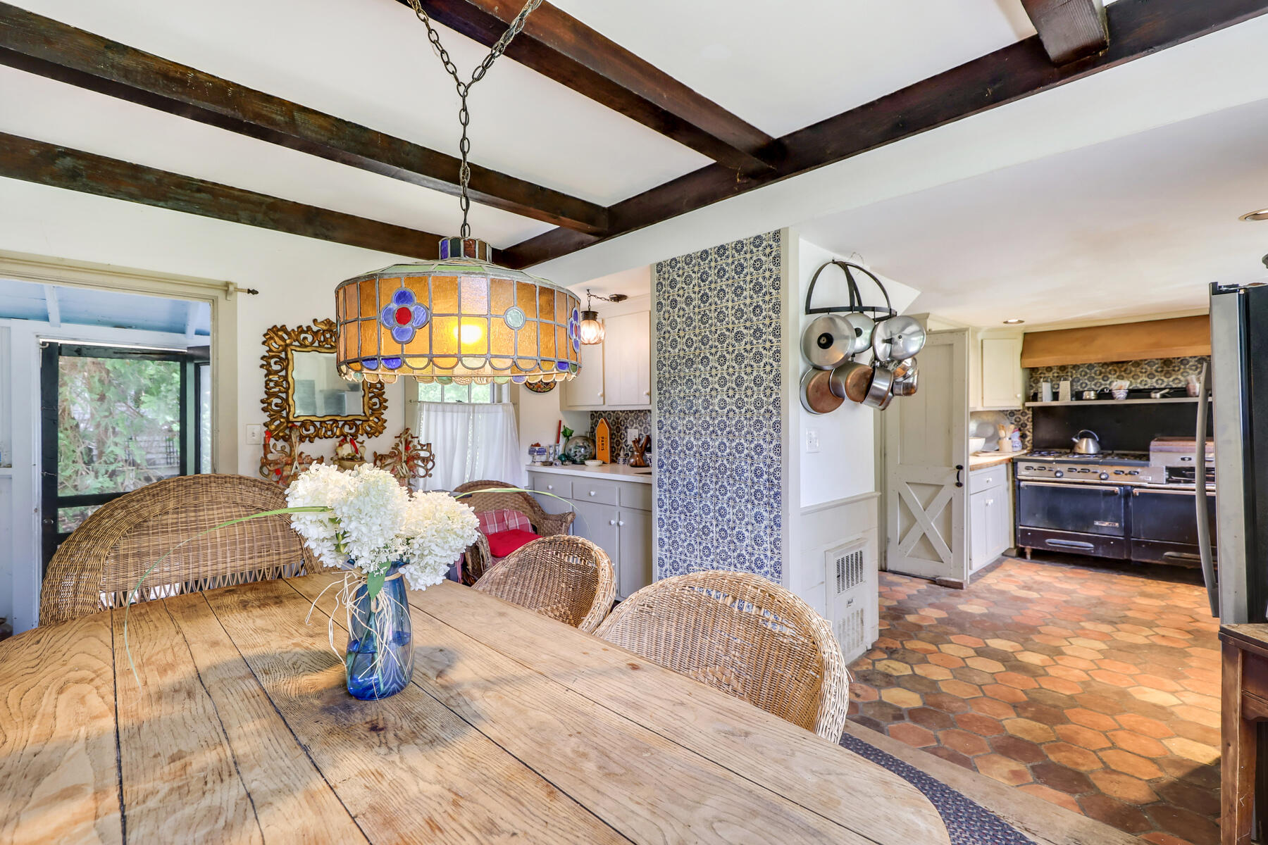 118 Old Stage Road Centerville, MA 02632 - Photo 14 of 41 a living room filled with furniture and a chandelier