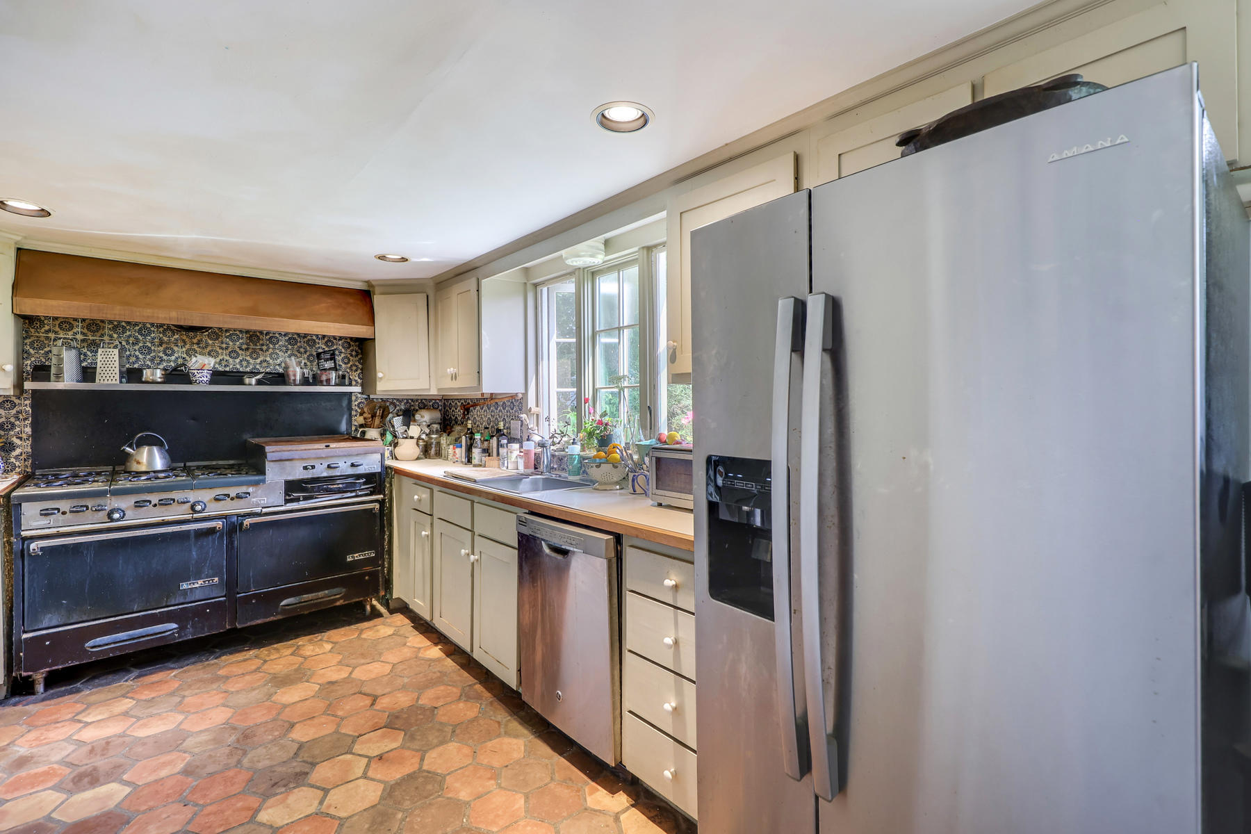 118 Old Stage Road Centerville, MA 02632 - Photo 15 of 41 a kitchen with stainless steel appliances granite countertop a refrigerator and a stove top oven