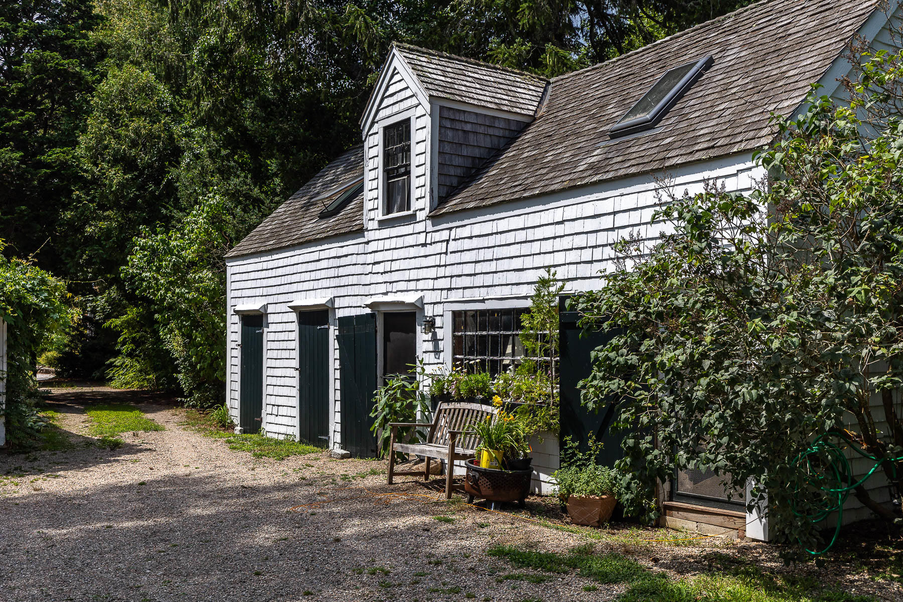 118 Old Stage Road Centerville, MA 02632 - Photo 23 of 41 a view of a house with backyard and sitting area