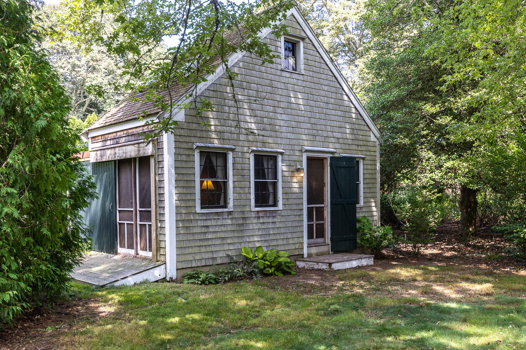 118 Old Stage Road Centerville, MA 02632 - Photo 28 of 41 a view of a house with a yard