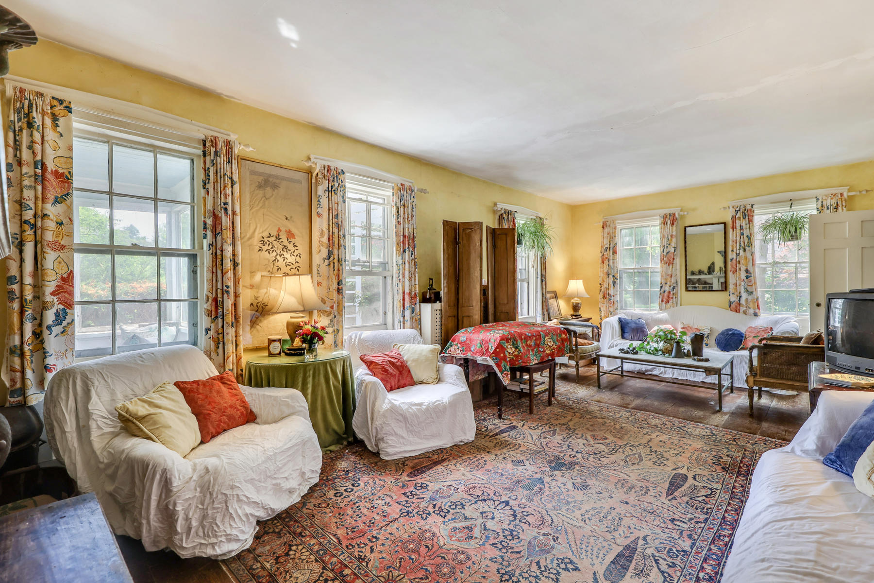 118 Old Stage Road Centerville, MA 02632 - Photo 5 of 41 a living room with furniture and a large window