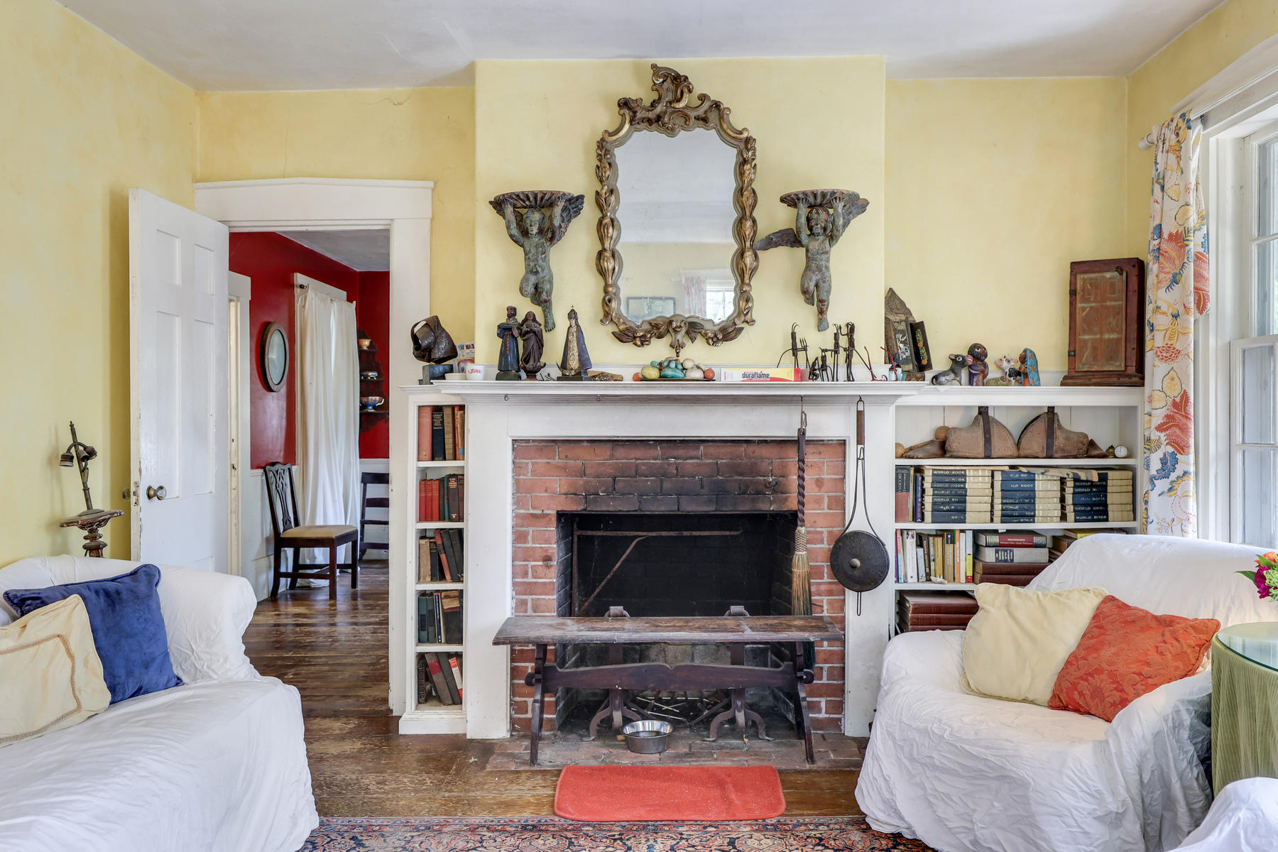 118 Old Stage Road Centerville, MA 02632 - Photo 6 of 41 a living room with furniture and a fireplace