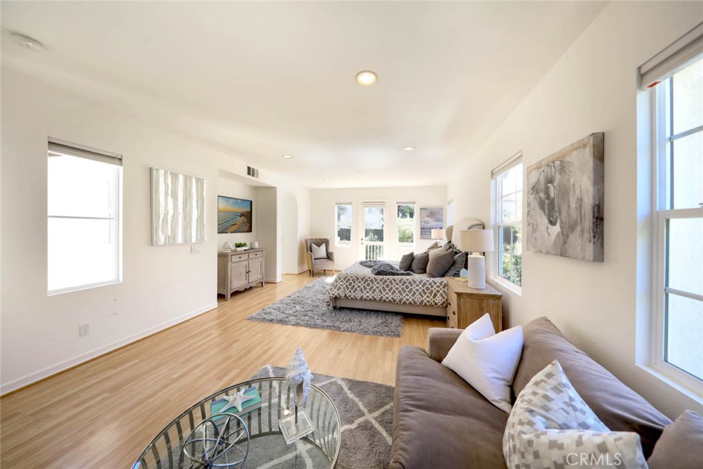 10 Cavaillon Newport Coast, CA 92657 - Photo 19 of 47 a living room with furniture and a flat screen tv