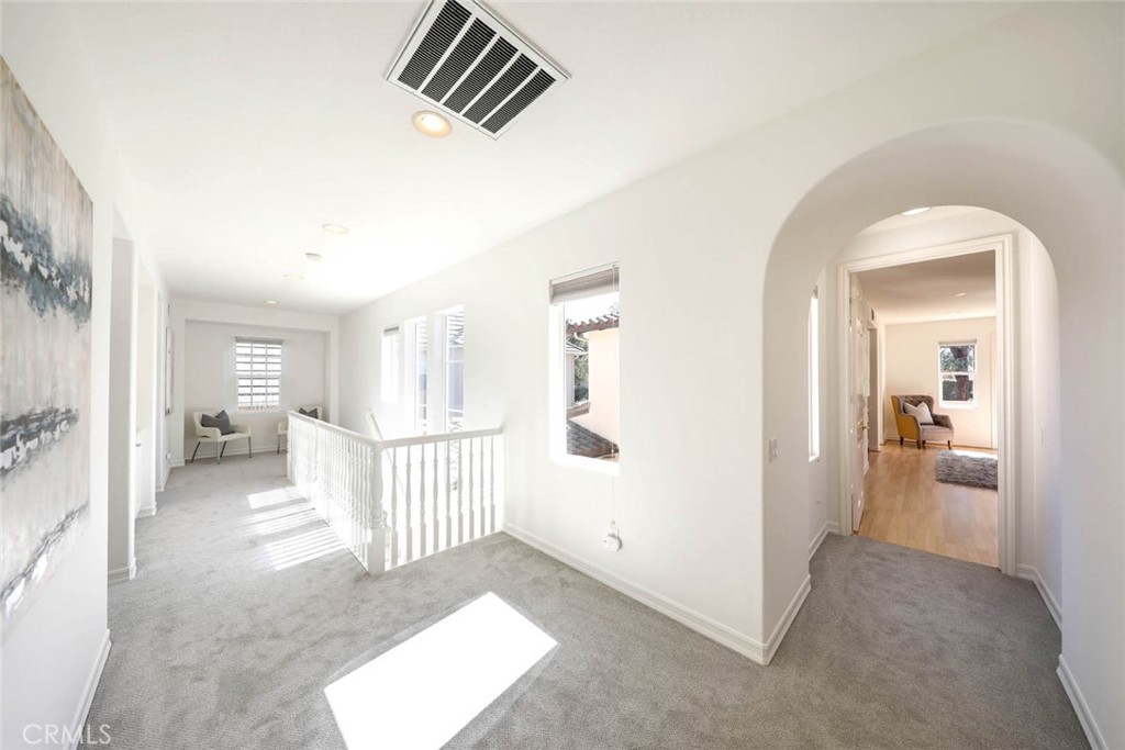10 Cavaillon Newport Coast, CA 92657 - Photo 25 of 47 a view of a hallway with a livingroom and a way to kitchen