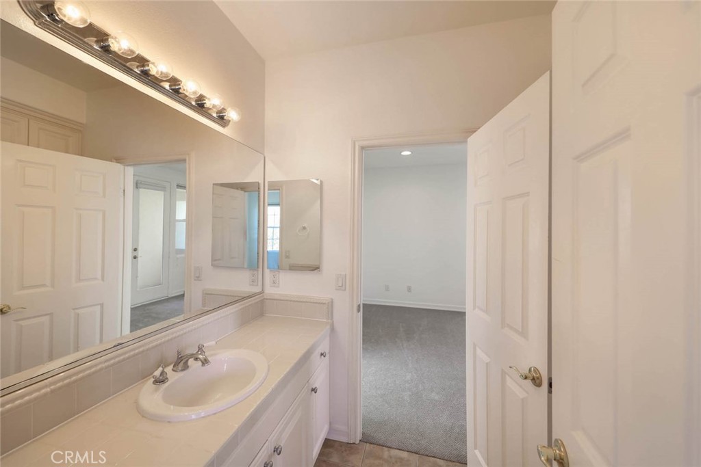 10 Cavaillon Newport Coast, CA 92657 - Photo 29 of 47 a bathroom with a sink and a mirror
