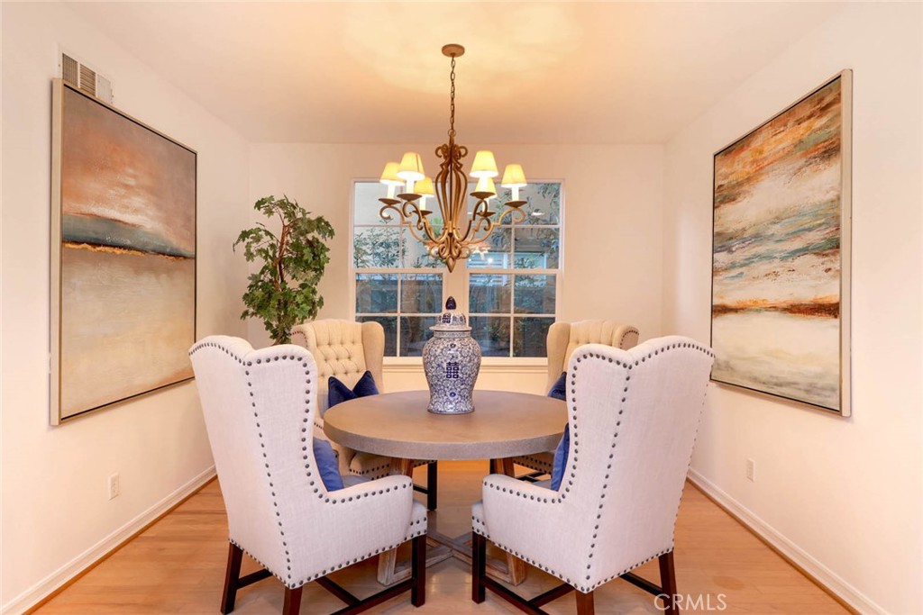 10 Cavaillon Newport Coast, CA 92657 - Photo 42 of 47 a dining room with furniture and window