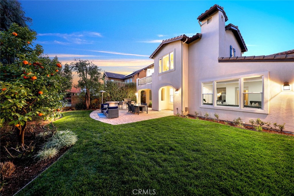 10 Cavaillon Newport Coast, CA 92657 - Photo 10 of 47 a backyard of a house with table and chairs
