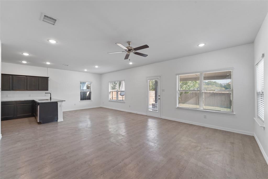 4651 Raleigh Dalton Road Dallas, TX 75227 - Photo 3 of 19 Open-concept living area with wood-finish flooring, recessed lighting, and a ceiling fan