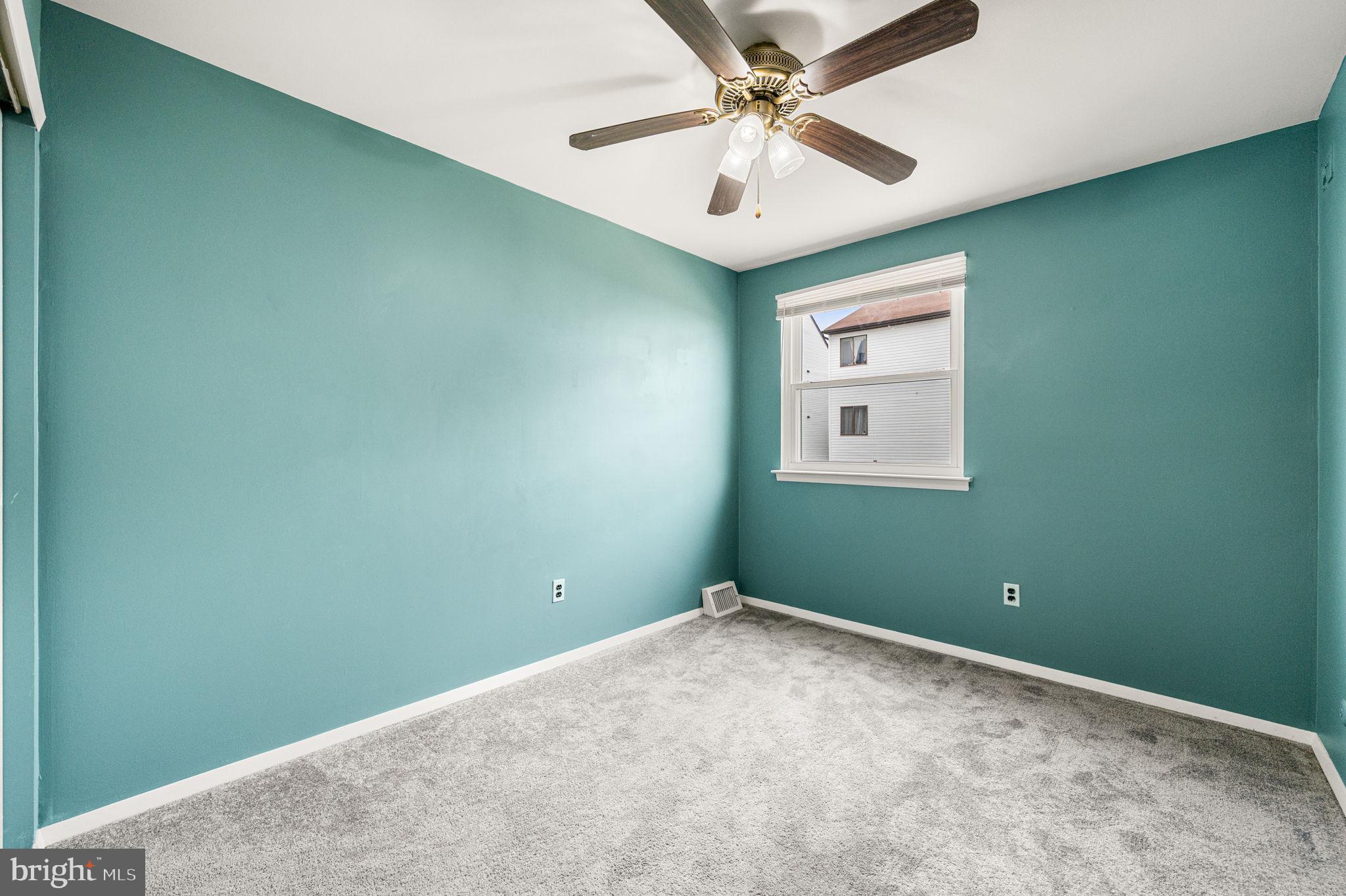 9578 State Rd., Unit A Philadelphia, PA 19114 - Photo 14 of 27 a view of a room with a fan and a window