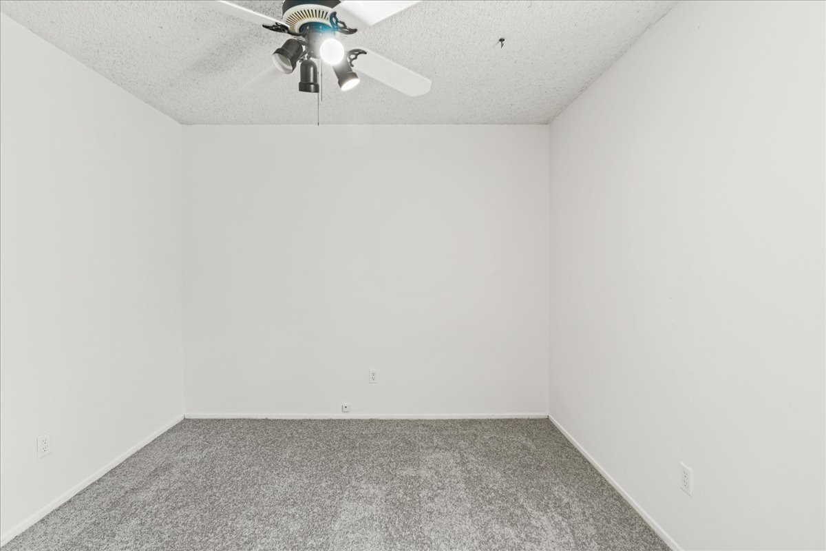 5403 Valencia Court Georgetown, TX 78628 - Photo 25 of 34 a view of a small space with carpet