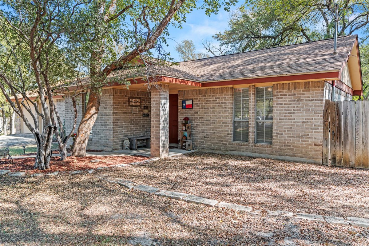 5403 Valencia Court Georgetown, TX 78628 - Photo 34 of 34 a front view of a house with a yard