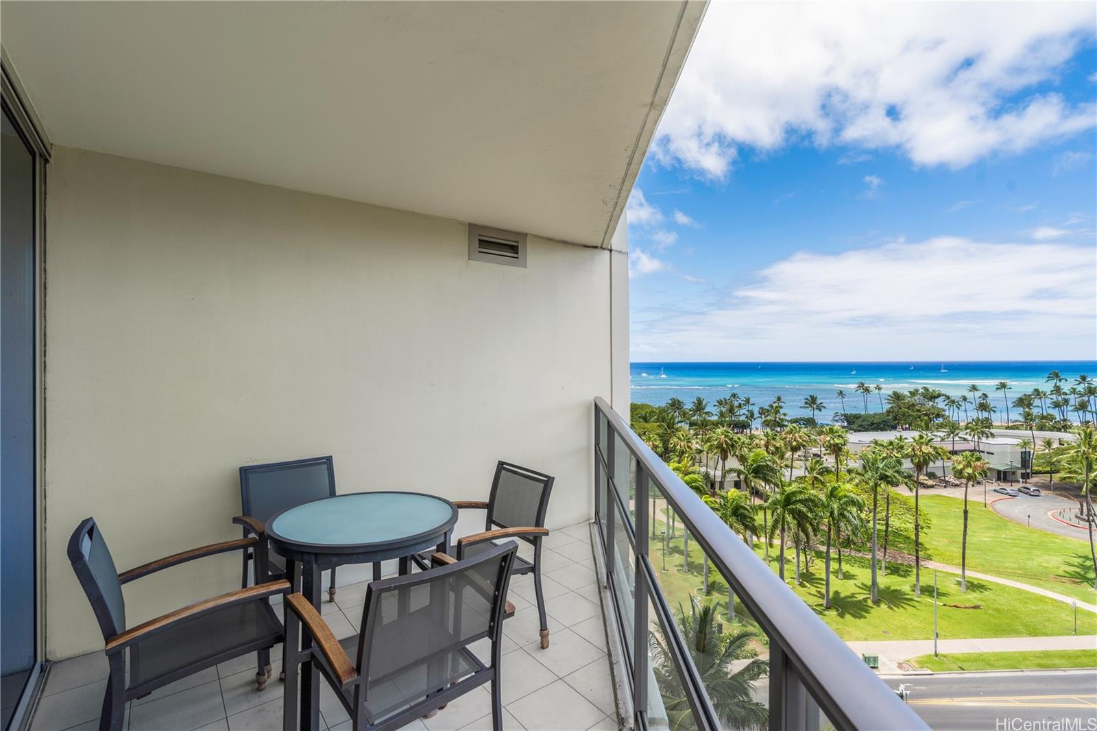 223 Saratoga Road, Unit 1115 Honolulu, HI 96815 - Photo 22 of 25 a view of a chairs and table in the balcony
