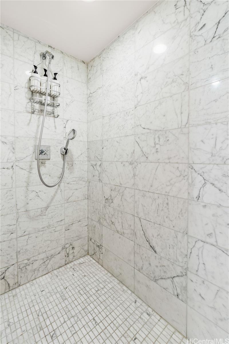 223 Saratoga Road, Unit 1115 Honolulu, HI 96815 - Photo 3 of 25 a bathroom with a shower