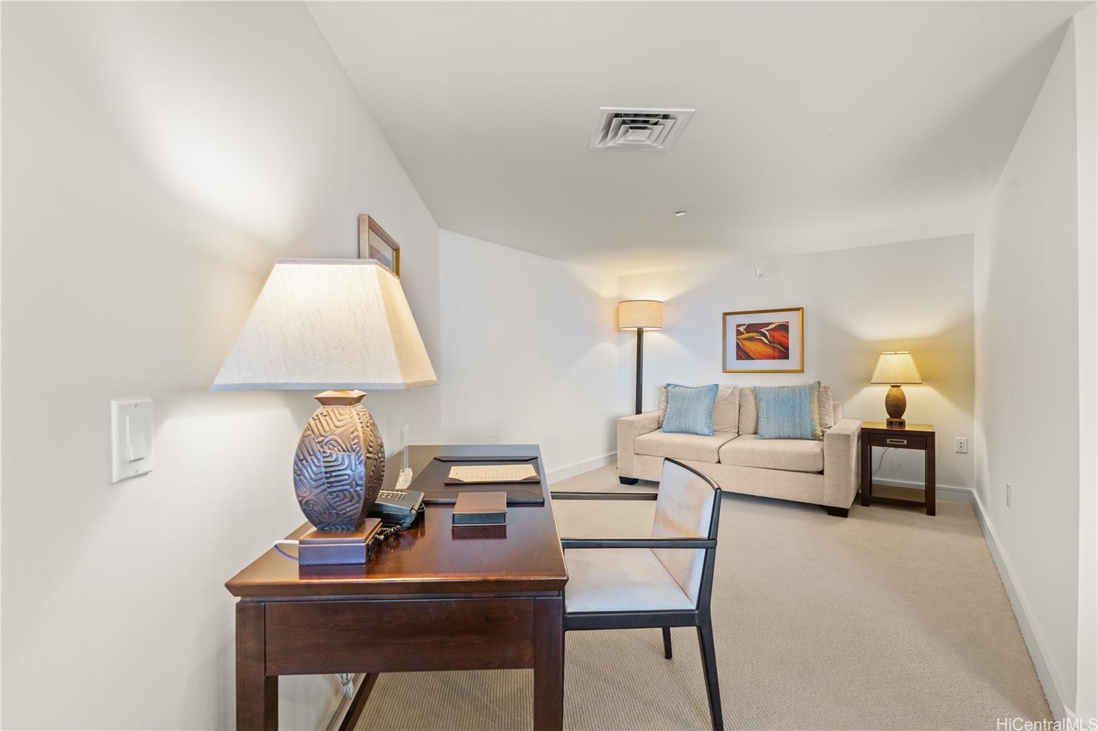 223 Saratoga Road, Unit 1115 Honolulu, HI 96815 - Photo 9 of 25 a living room with furniture