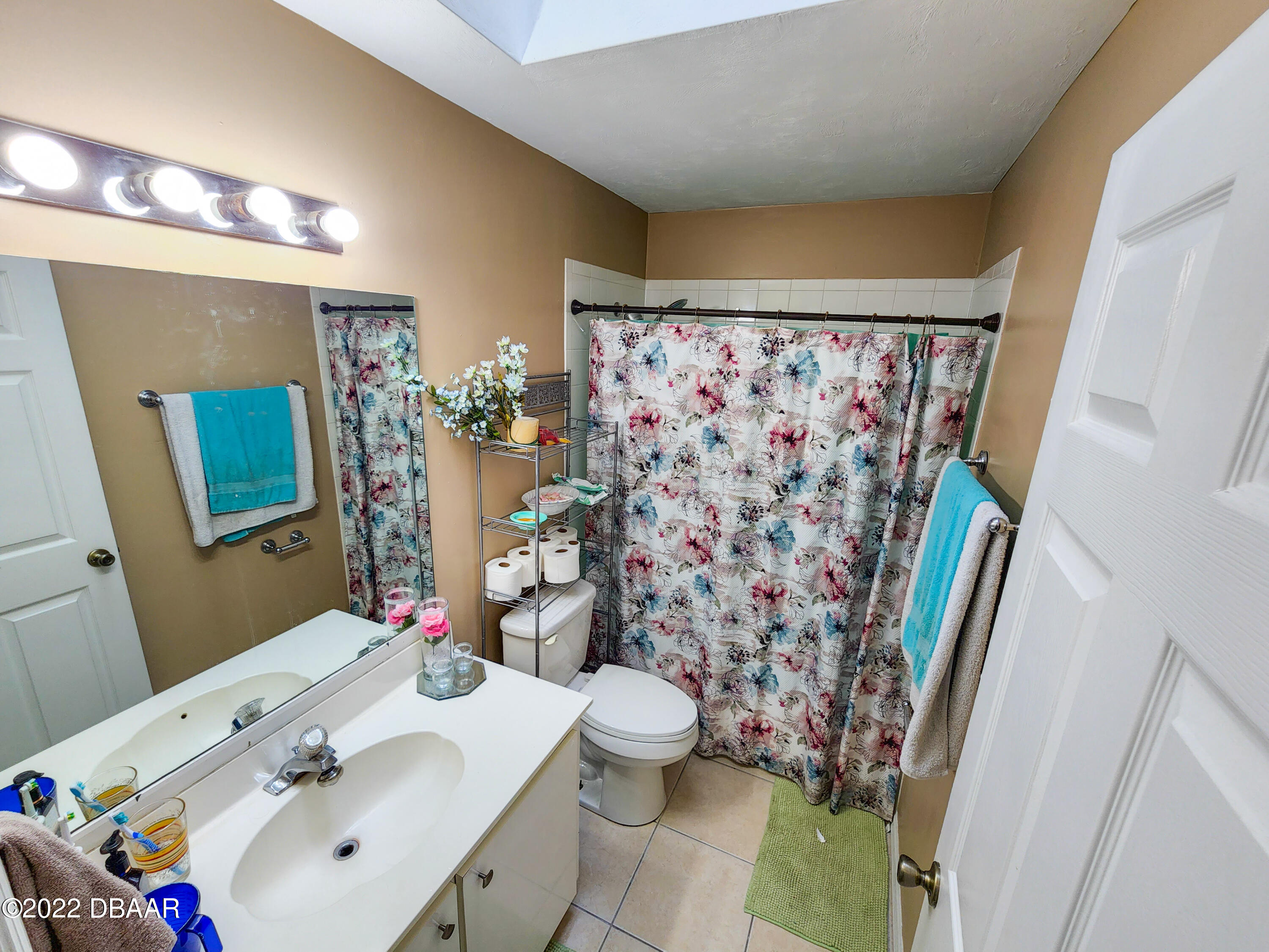 1467 Bay Grove Drive Port Orange, FL 32129 - Photo 22 of 35 a bathroom with a sink toilet and shower