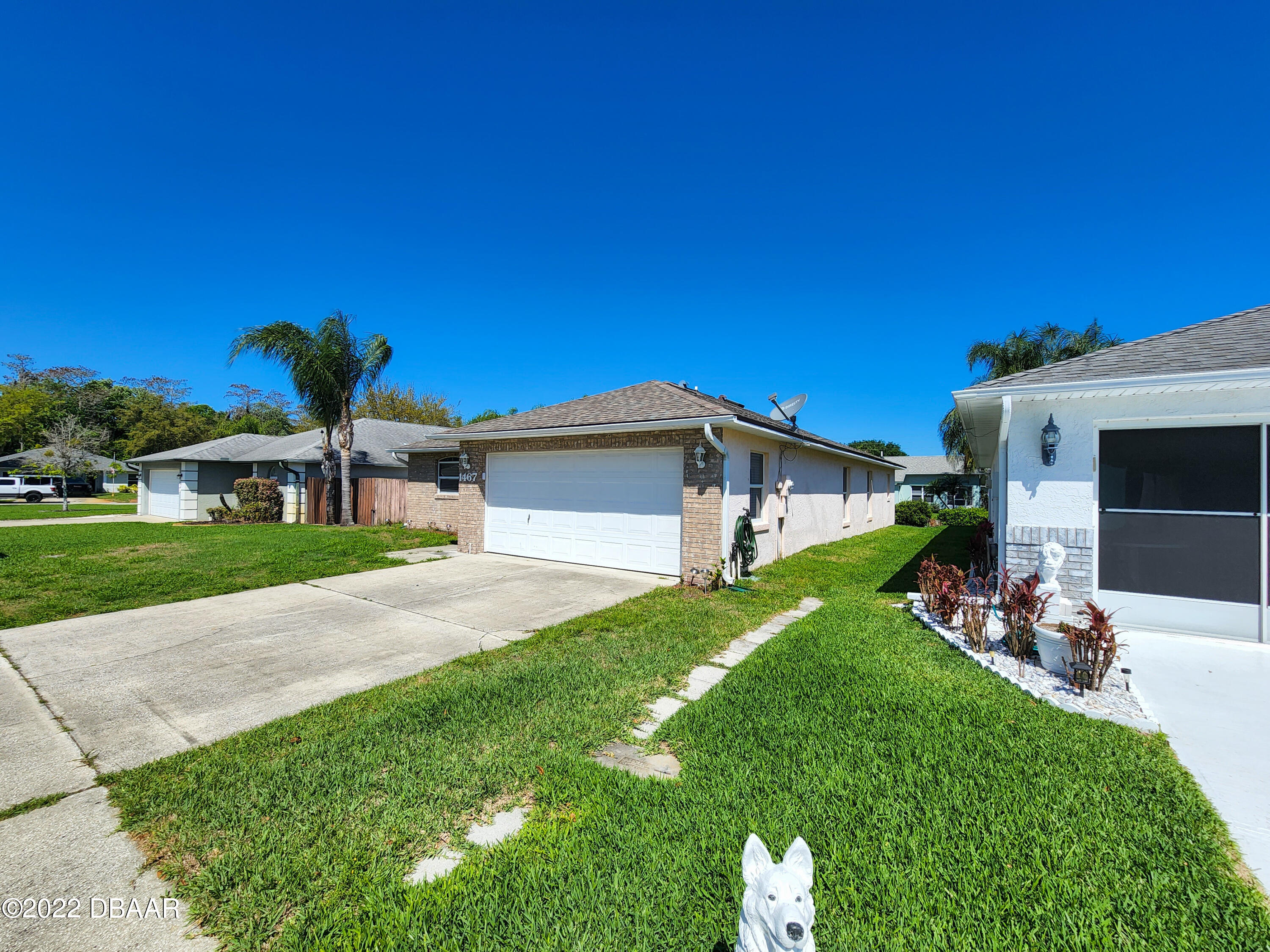 1467 Bay Grove Drive Port Orange, FL 32129 - Photo 5 of 35 a view of a house with a yard porch and sitting area