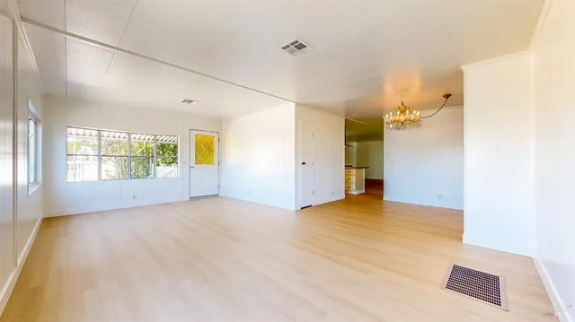 a kitchen with cabinets a sink and appliances