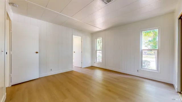 a bathroom with a sink and a window