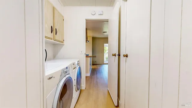 a view of a wooden door and outdoor space