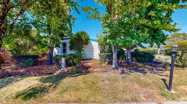 an outdoor space with furniture and a fireplace